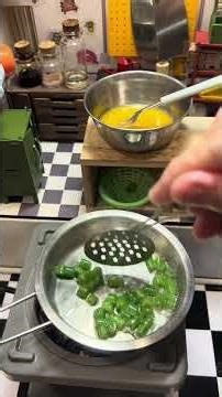 Mini kitchen cooking french bean fried egg