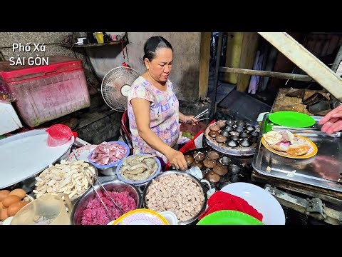 So unique BANH CAN only 35k per portion with A LOT of shrimp, squid, beef, chicken, only eaten wi...