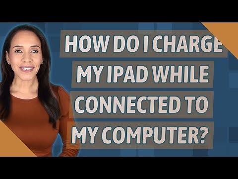 How do I charge my iPad while connected to my computer?