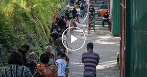 Food Line in Geneva Stretches To More than 1,500 People