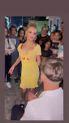 Vibrant Nighttime Dance Performance in Yellow Dress