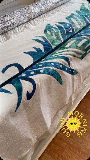 Perfect way to start a Saturday morning! Quilt #4 on the same load! Let’s get this feather quilted! I am going to have a weeks worth of biding to do! This feather pattern is by by@madi_hastings using two Widebacks by Northcott Fabrics. #avairyfeatherquilt @northcottfabric #stonehengefabric #ombrefabrics #2SQ2025 #108widebacksforthewin | Second Story Quilting