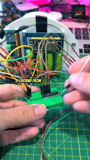 Connecting the DC converter to the mini breadboard.