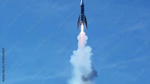 Exciting rocket launch demonstration at the space center in summer 2023 with powerful ascent and detailed smoke plume