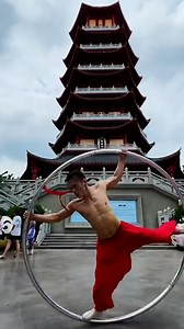 38K views · 910 reactions | Dressed in traditional Chinese clothing, a young Cyr wheel dancer demonstrates his incredible skills at tourist sites, becoming a must-see attraction in his own right. #ChineseTrending #GenZers #FunChina | China Plus Culture | Facebook