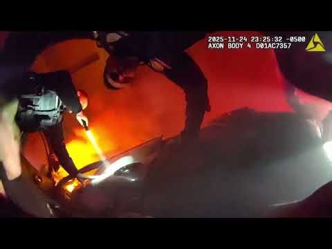 Suffolk Police Bodycam Video Shows Officers Saving Man From Burning Vehicle - SCPD video