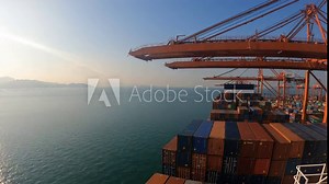 Shekou, China - 09.16.2023 Timelapse of container ship has loading operations with few gantry cranes in Shekou Container Terminal during.