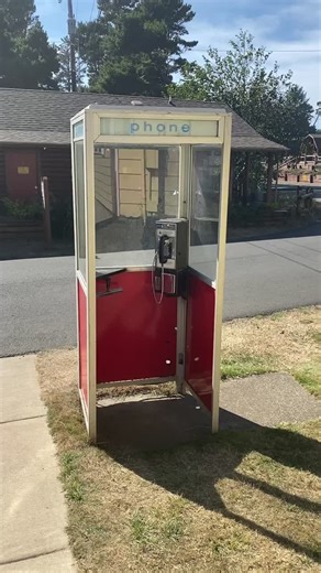 Working Pay Phone in a Phone Booth