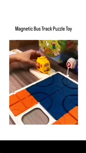 Universal Laughs on Instagram: "This X post features a 13-second video of an adult assembling modular track tiles in real-time to guide a yellow toy bus along a path, captioned "so fun," highlighting the toy's engaging, hands-on play. (El), a verified user with 3,876 followers, the content has gone viral with 5.8 million views, 14,370 likes, and replies recommending similar Montessori-style puzzles on Amazon and AliExpress. The toy, a Chinese "拼拼乐" (assembly fun) bus puzzle set, supports early c