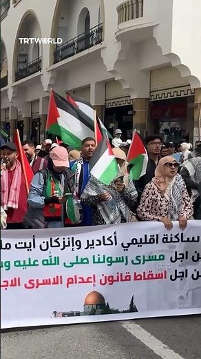 Image of infamous illegal Israeli settlers appears on a flag at pro-Palestine rally in Morocco