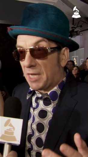Elvis Costello, Diana Krall Reflect On Whitney Houston At 2012 GRAMMYS | GRAMMY Red Carpet Flashback