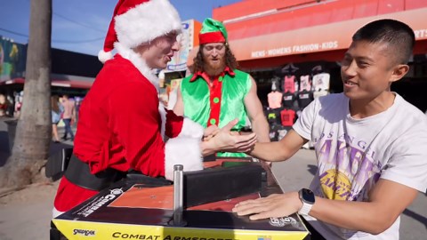 Beat Santa at Arm Wrestling, Win $1,000 Gift!
