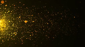 Download Beautiful gold shimmering particles with lens flare on black background for free