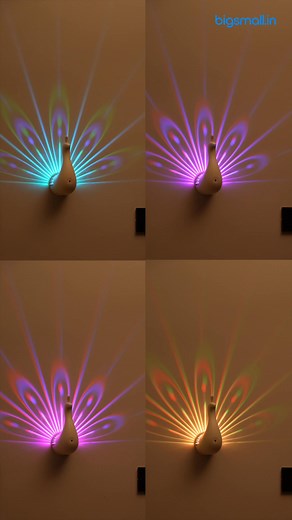 ADD A TOUCH OF LUXURY TO YOUR WALL! Introducing the Luma Peacock LED Wall Lamp ✨ Multi-color light modes | 🎮 Remote controlled brightness & effects 🛠️ Easy wall-mount design | ⚡ Energy-efficient & noise-free operation Was ₹2,999, now just ₹1,799! (Flat 40% OFF) Prepaid orders get priority dispatch & secure checkout. What are you waiting for? Make your space unforgettable - order now! | bigsmall.in