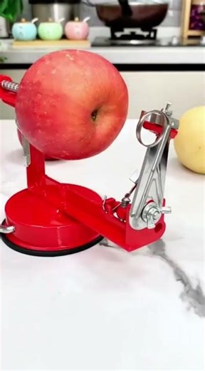 A simple spin transforms an apple into art, peeling perfection in seconds without a single blade now
