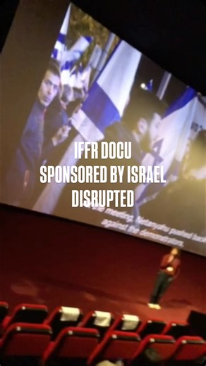 Whispering Media on Instagram: "While IDFA recently barred CoPro, the Israeli content marketing organization, from participating due to its state-linked funding, the International Film Festival Rotterdam (IFFR) continues to showcase CoPro-supported productions. At IFFR today, “Far from Main”, the film by Roy Cohen funded by CoPro, premiered amid protest: two demonstrators briefly disrupted the screening to voice opposition to Israeli state funding in cinema. The incident highlights the ongoing t