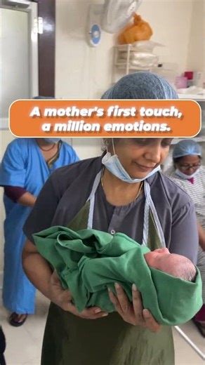 A mother's first touch, a million emotions.