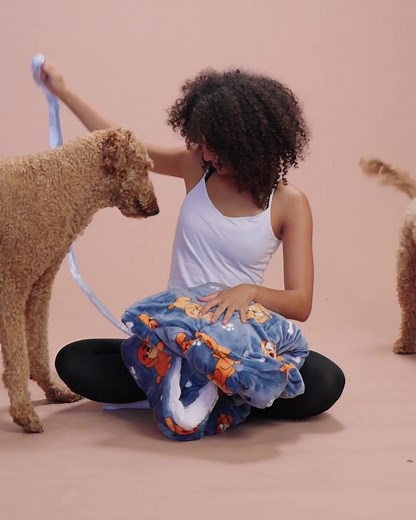 ATTENTION all Labradoodle, Cavoodles and Poodle lovers… The Oodle Oodie is HERE! 🐾🐾 Made from our world famous and universally adored Sherpa and Toastytek™ fleece that’s deliciously warm, soft and ridiculously comfy. The Oodle Oodie is paws-itively adorable - get yours now. ✅ Loved by MILLIONS of happy customers worldwide ✅ Dreamy soft, toasty warm oversized wearable blanket ✅ Made from our famous blend of Sherpa & ToastyTek™ fleece ✅ Snuggly Pet Pouch: Top of the front pocket opens to allow y