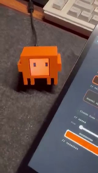 this guy 3D printed and vibe coded a tiny Claude robot for his deskit's called "Clawd Mochi." runs on an ESP32 chip with a tiny display that shows animated expressions.> hosts its own WiFi hotspot. zero cloud and zero internet required. fully offline> live-switch between animated faces, a terminal emulator, and a drawing canvas from your browser> total cost: under $8> takes less than an hour to build3D print files AND the full build are both open source too this is the greatest thing anyone has 