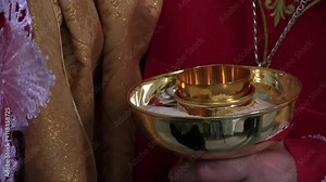 Communion In The Catholic Church / Catholic priest communion of believers in the Catholic Church. Stock Video