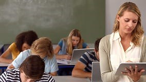Students Taking Notes and Teacher Using Tablet Pc Stock Video - Video of group, notes: 50966023