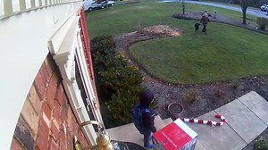 Kid Excited After Accidentally Seeing Christmas Gift Package at His Front Door