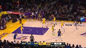 Austin Reaves with the halfcourt buzzer beater