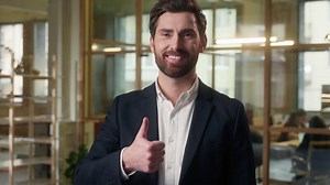 Happy man in office businessman raise finger thumb up good recommend business company portrait entrepreneur showing approval gesture like smiling cheerful middle-aged Caucasian guy male vote respect
