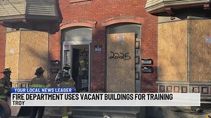 Training new Troy firefighters in vacant buildings