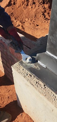 Leveling columns just before we pick up th roof!