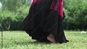 african women dancing a folk dance in traditional costumes and sing