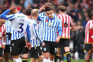 SWFC News: Wednesday defender spotted in Manchester ahead of potential switch