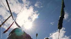 Little girl having fun while bungee jumping up high on trampoline. Little girl bouncing up and down on a bungee trampoline.