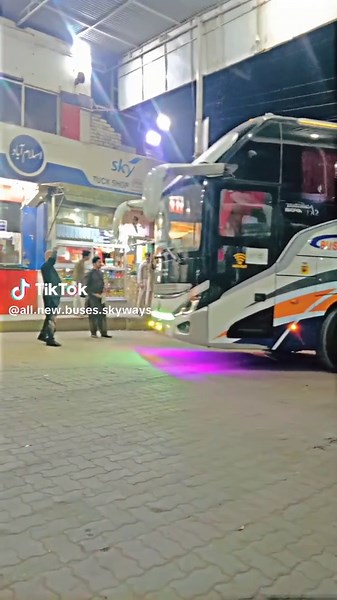 Nighttime View of Skyways Business Class Bus