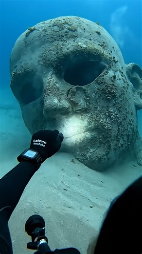 POV: A Giant Sunken Stone Face Stared Back… Then Something Moved in the Eye