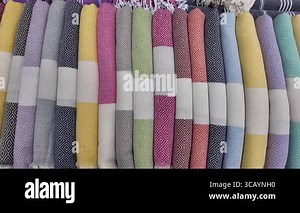 Explore a vibrant collection of handmade textiles displayed for sale Stock Video Footage - Alamy
