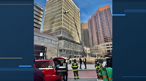 Baltimore building explosion injures 23, traps workers