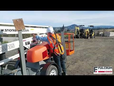 How do I set up a Snorkel Cherry Picker?