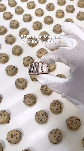 Magnum Ice Cream on Instagram: "An exclusive look inside our factory to make some ✨ Bon Bons ✨ The perfect little treat dipped in Magnum’s signature cracking chocolate, and filled with velvety ice cream and gooey sauce - spoiler alert, you’re about to crave these 24/7 😍 #MagnumIceCream #BonBonObsessed"