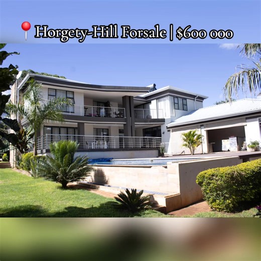 🚩 New Mandate 🏡 Hogerty Hill | $600,000 Elegant double-storey home in a secure gated community, set on 2000sqm with borehole (personal & communal) and 5kVA solar backup. ✨ 5 bedrooms (guest suite downstairs) ✨ Spacious main bedroom with ensuite & balcony ✨ Modern kitchen with scullery & pantry ✨ Open-plan living & dining study ✨ Entertainment area with fire pit ✨ Swimming pool with shower facilities ✨ Double lock-up garage ✨ Staff quarters Beautiful landscaped garden, sprinkler system, water f