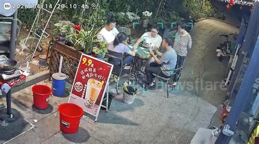 Resident cheats death as air conditioner crashes to ground in China