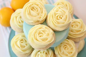 257K views · 436 reactions | We have a foot of snow in the forecast but I'm inside pretending it's Spring with these LEMON SUGAR COOKIES! https://butterwithasideofbread.com/lemon-sugar-cookies/ I show you exactly how to make those pretty rosettes with my lemon buttercream frosting too! It's SO EASY!! | Butter with a Side of Bread | Facebook