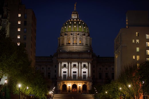 Why is the Pennsylvania State Capitol Building shining purple lights today?