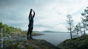Muscular Sportsman Stretching Elastic Band At Top Of Mount, Jock Man Training Arms Muscles