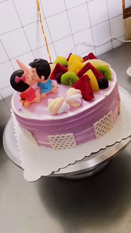 Making Purple With Fruits As Toppings Cake