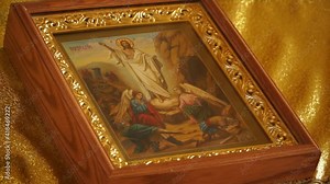 The face of the saint on the icon. A picturesque image of the saint and the events of the scripture. Icons on the church walls. Prayer. Religious art. Church attributes.