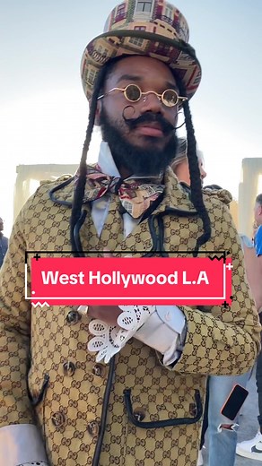 Black Willy Wonka Gucci trenchcoat drip with the Louis Vuitton, Takashi Murakami trunk and Louis Vuitton Cane at brunch in Los Angeles, California #fyp #willywonka #foryou #fashiontiktok #losangeles