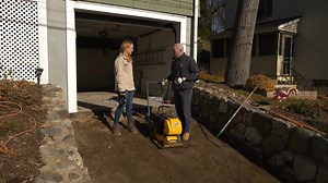 Does your driveway need a touch up? Mark McCullough shows a homeowner how to repave a concrete driveway to boost curb appeal and make it safer! | This Old House