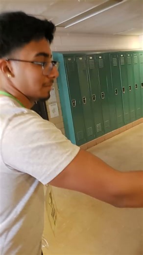 Me and my friend flashing the school hallway lights prank