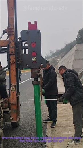 Road Safety: Workers Installing W-Beam Guardrail Poles With Machinery!